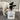 Dog interacting with a Cheshire canister on a wooden floor
